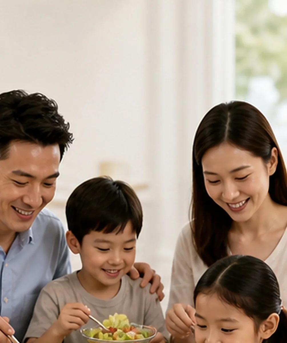 A family filling glasses of water together in a bright modern kitchen